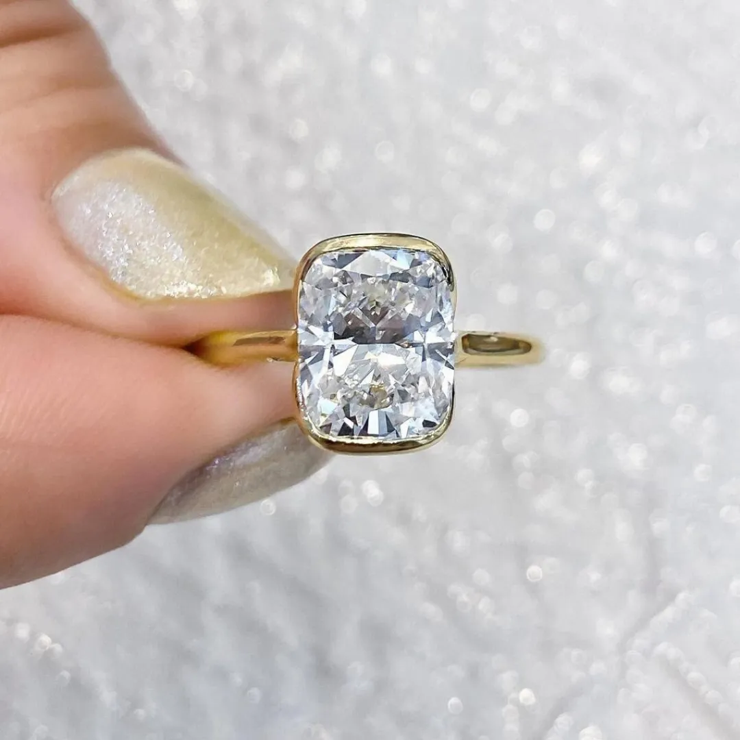 /public/photos/live/3 Stone Half Bezel Set Cushion Moissanite Engagement Ring 776 (2).webp